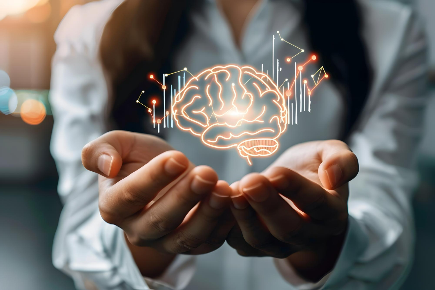 Imagem ilustrando o conteúdo sobre mentalidade de crescimento mostrando uma mulher jovem com as mãos juntas e, sobre elas, uma ilustração de cérebro e circuitos.