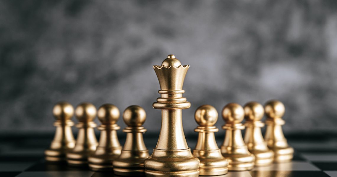 Gold Chess on chess board game for business metaphor leadership concept Gold Chess on chess board game for business metaphor leadership concept